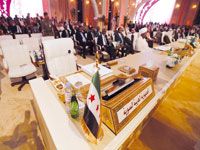 Le Qatar réussit à octroyer un siège à l'opposition syrienne Le Sommet arabe à l'heure de Doha
