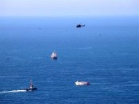 Exercice de sauvetage de l'équipage d'un bateau de pêche au large d'Oran