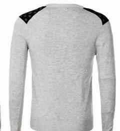 حجز قمصان صيفية تحمل رمز الصليب بغليزان