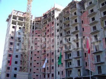 Le bâtiment séduit... par ses milliards