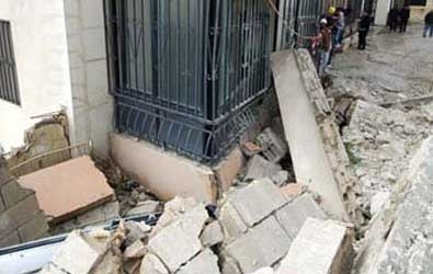 إنهيار جزئي لمبنى في حي 