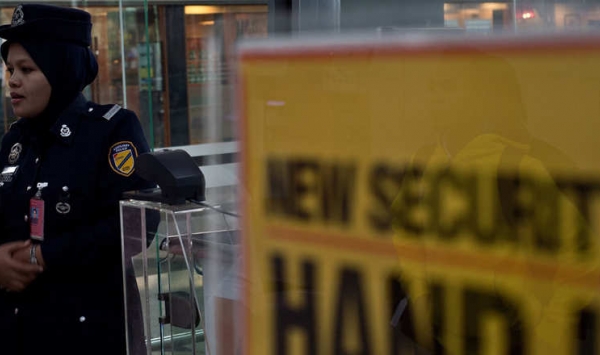 اعتقال فتاة بمطار كوالالمبوربماليزيا تزوجت عنصرا بداعش عبر 