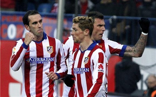 ماندزوكيتش وراؤول جارسيا يقودان أتلتيكو للفوز على غرناطة