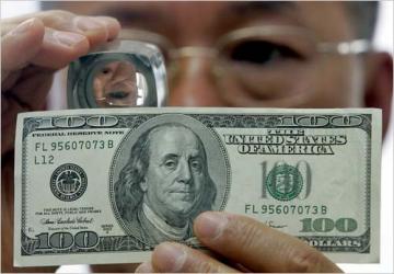 إحباط ترويج 29 ألف دولار مزوّرة بمعسكر