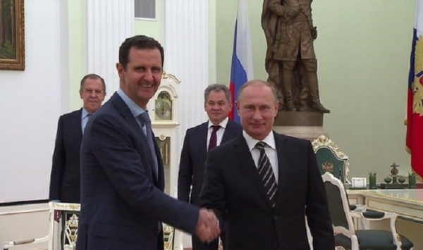 بشار الأسد في أول زيارة له إلى الخارج منذ بداية النزاع في سوريا في 2011