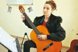 Une guitariste de talent !