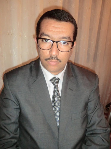 أستاذ القانون الدستوري و نائب عميد كلية الحقوق بجامعة الجيلالي اليابس بسيدي بلعباس الدكتور محمد الأمين بولوم ل