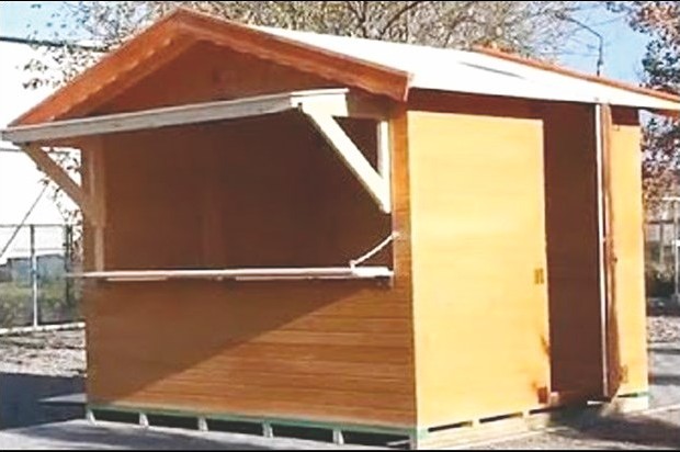 Le dossier des kiosques en bois remis sur la table