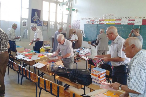Distribution de fournitures scolaires aux démunis