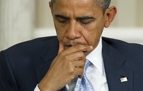 أوباما يأمر بتنكيس الأعلام ترحما على ضحايا مجزرة كولورادو