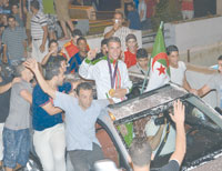 Notre champion olympique de retour hier à Alger                                    Accueil triomphal pour le héros