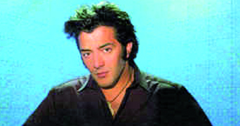 Taha rend hommage à Dahmane El Harrachi