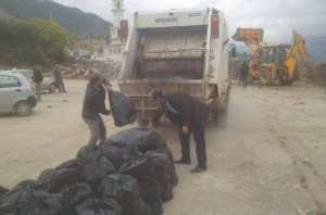 BOUZEGUÈNE (TIZI OUZOU)  -  Rachid Oudali, P/APC et éboueur volontaire