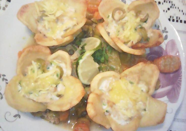 طاجين الزيتون بورود البطاطا