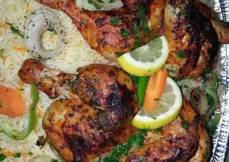 دجاج محمر مع الارز بالجزر