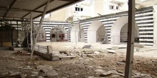 Syrie: des quartiers de Homs bombardés, maisons incendiées à Idleb