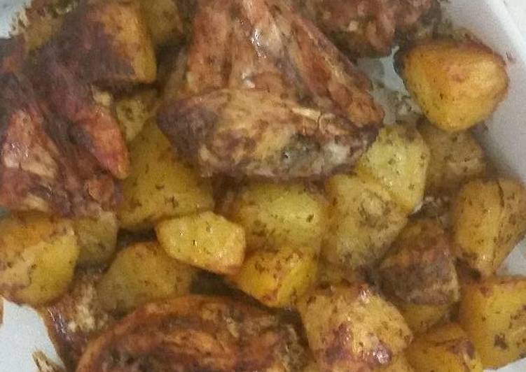 صينيه الدجاج والبطاطا بخلطه الكزبره والثوم