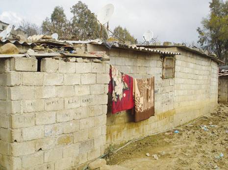 Le bidonville se reconstitue                                    Quartier Harraten