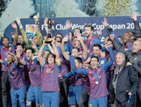 A l'étranger                                    Mondial des clubs/ Barcelone, sacré