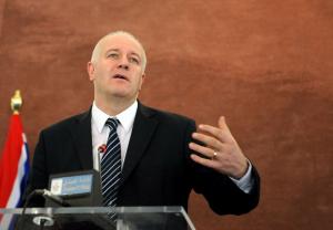British Minister of State Bill Rammell gestures during a