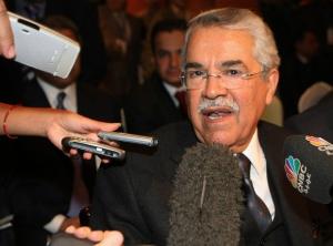 Saudi Oil Minister Ali al-Nuaimi speaks to the press