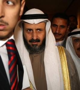 Kuwaiti Oil Minister Mohammad al-Olaim arrives surrounded by security