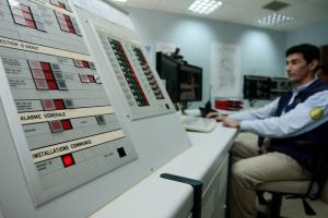 A technician works in the control room of Krechba