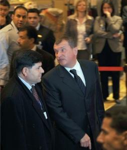 Russian Deputy Prime Minister Igor Sechin (C) arrives to