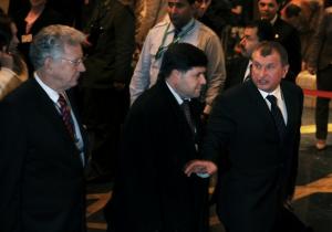 Russian Deputy Prime Minister Igor Sechin (R) arrives for