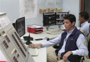 A worker monitors the Krechba gas plant on the