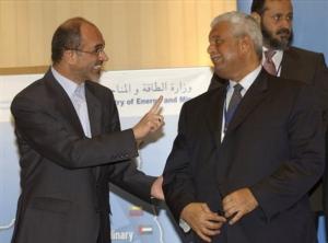 Iran's Minister of Petroleum Gholam Hossein Nozari, left, gestures