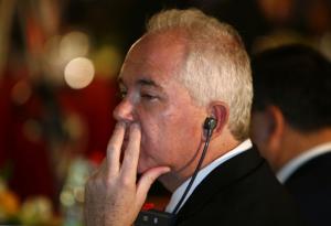 Venezuela's Energy Minister Rafael Ramirez listens to the speech