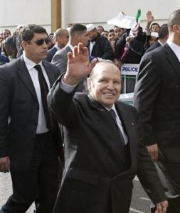 Algeria's President Abdelaziz Bouteflika waves during his official visit
