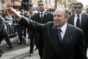 Algeria's President Abdelaziz Bouteflika waves during an official visit