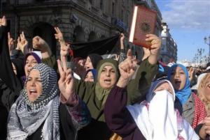 Women demonstrate with tens of thousands of protesters Friday,