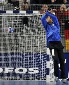 Algeria's goalkeeper Rabir Lamine misses to save a shot