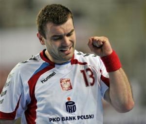Poland's Bartosz Jurecki reacts after the 39-22 win in