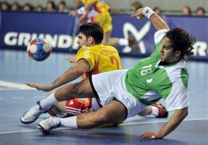 Macedonia's Mitko Stoilov, left, and Algeria's Hamza Toum challenge