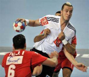 Germany's Pascal Hens tries to break through the Algerian
