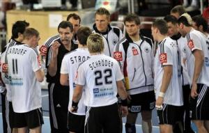 Germany's head coach Heiner Brand coaches the German team
