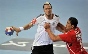 Germany's Pascal Hens, left, and Tunisia's Issam Tej challenge