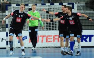 Germany's team celebrates during the match against Algeria during