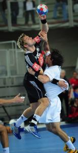 Germany's Stefan Schroeder (L) vies for the ball with