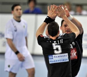 Germany's Dominik Klein, front, and Germany's Jens Tiedtke, back,