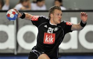 Germany's Lars Kaufmann throws during their Group C match