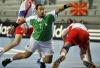 Algeria's Hichem Boudrali throws during the Group C match