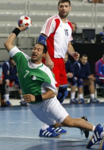 Algeria's Hichem Boudrali attempts to score next to Russia's