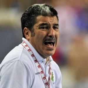 Algeria's head coach Kamel Akkeb shouts during the Group