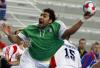 Algeria's Abderrahim Berriah attempts to score next to Russia's