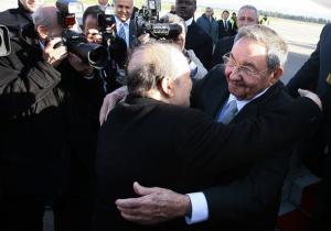 Algeria's President Abdelaziz Bouteflika (L) welcomes his Cuban counterpart